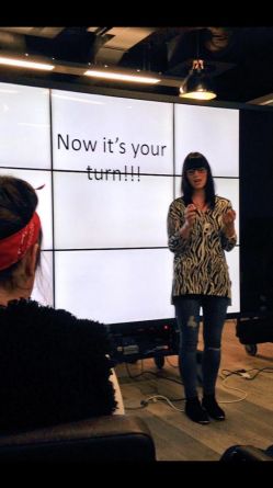 natalie on stage at colour project seminar