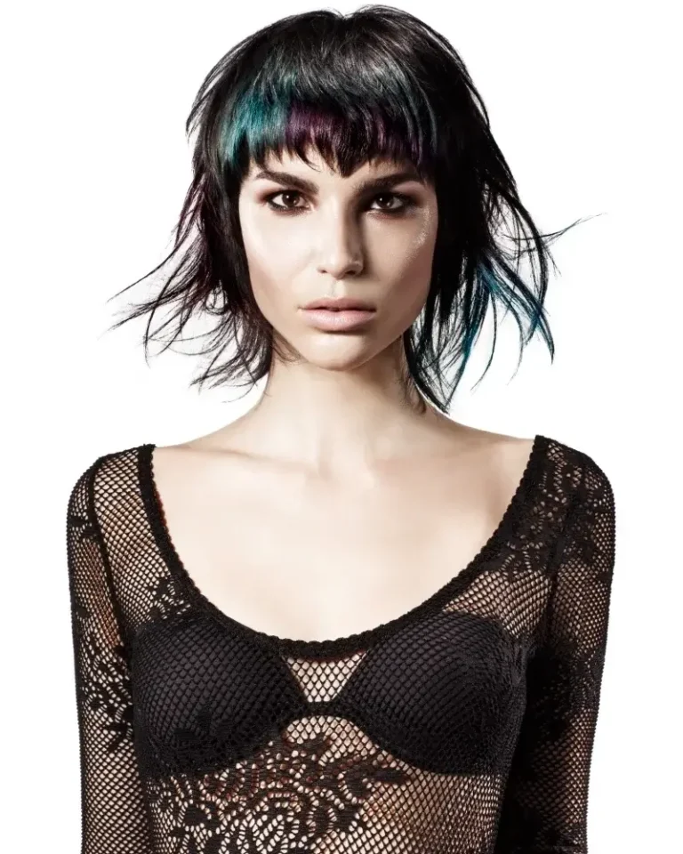 Model showcasing a sleek dark black short bob with sharp framing around the cheekbones