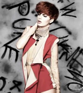 Auburn red pixie crop with textured side-swept bangs from Joseph Ferraro Hair collection