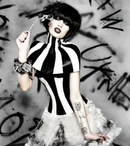 Classic short black bob with blunt bangs and black-and-white avant-garde styling shot by photographer Jack Eames