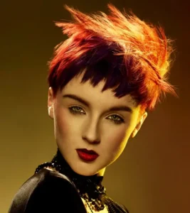 Edgy fiery red spiky crop with short blunt fringe styled for Joseph Ferraro Hair Rebel Rebel BHA 2015 collection