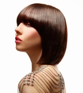 Sleek glossy brown bowl cut bob with heavy straight fringe styled for Joseph Ferraro Hair BHA 2010