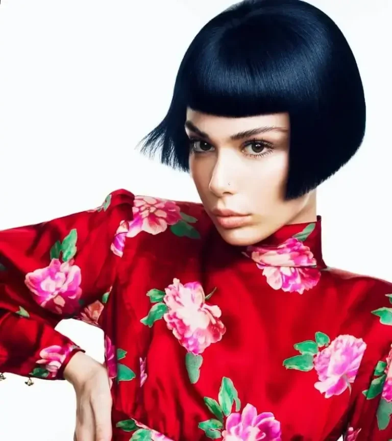 Sleek black blunt bob with short straight bangs by Joseph Ferraro Hair Evocative collection 2